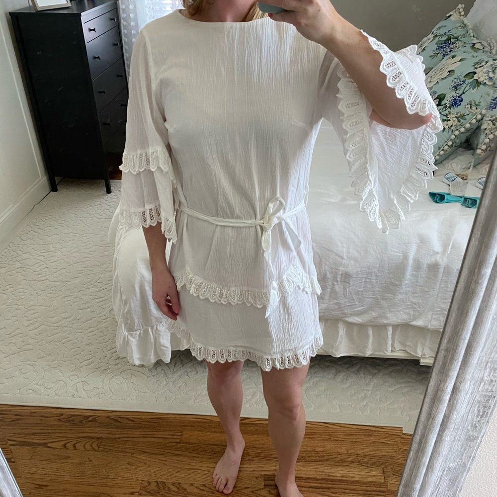 White dress with front tie and lace